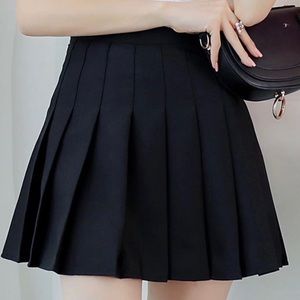 Black pleated skirt w/ built in shorts under. NEW
